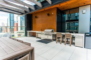 Outdoor terrace with bbq grills & sundeck